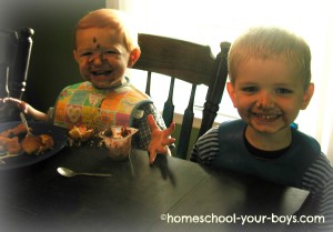 boys eating pudding